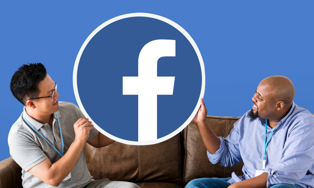 Professionals analyzing Facebook marketing strategies for brands