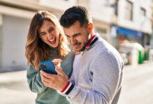 Advertisers analyzing enhanced Facebook Reels analytics dashboard