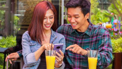 A smartphone displaying a Snapchat location-based story ad with a vibrant background.