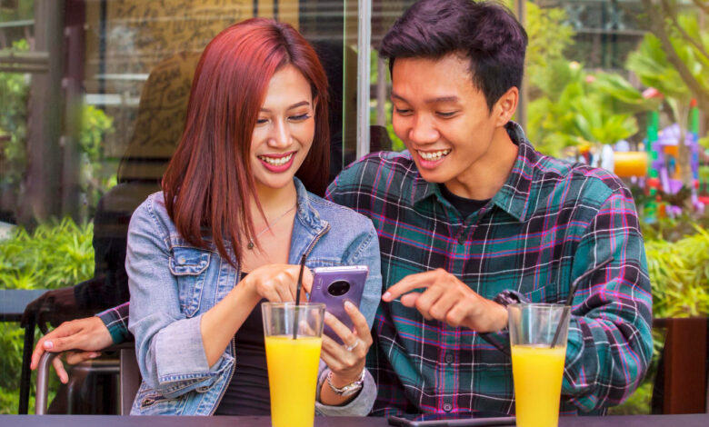 A smartphone displaying a Snapchat location-based story ad with a vibrant background.